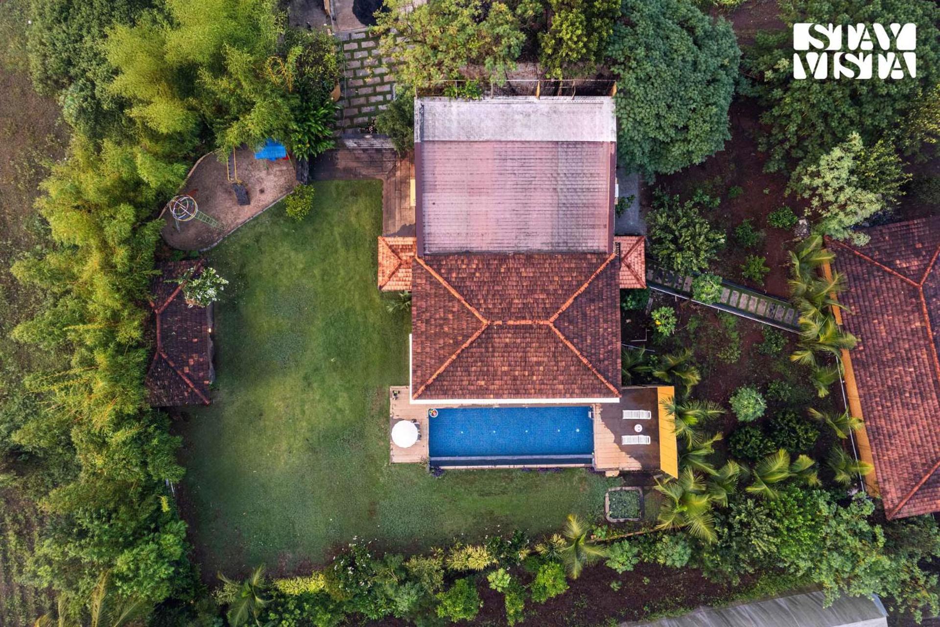 Stayvista At Countryside Meadows With Pool, Ac Púna Kültér fotó